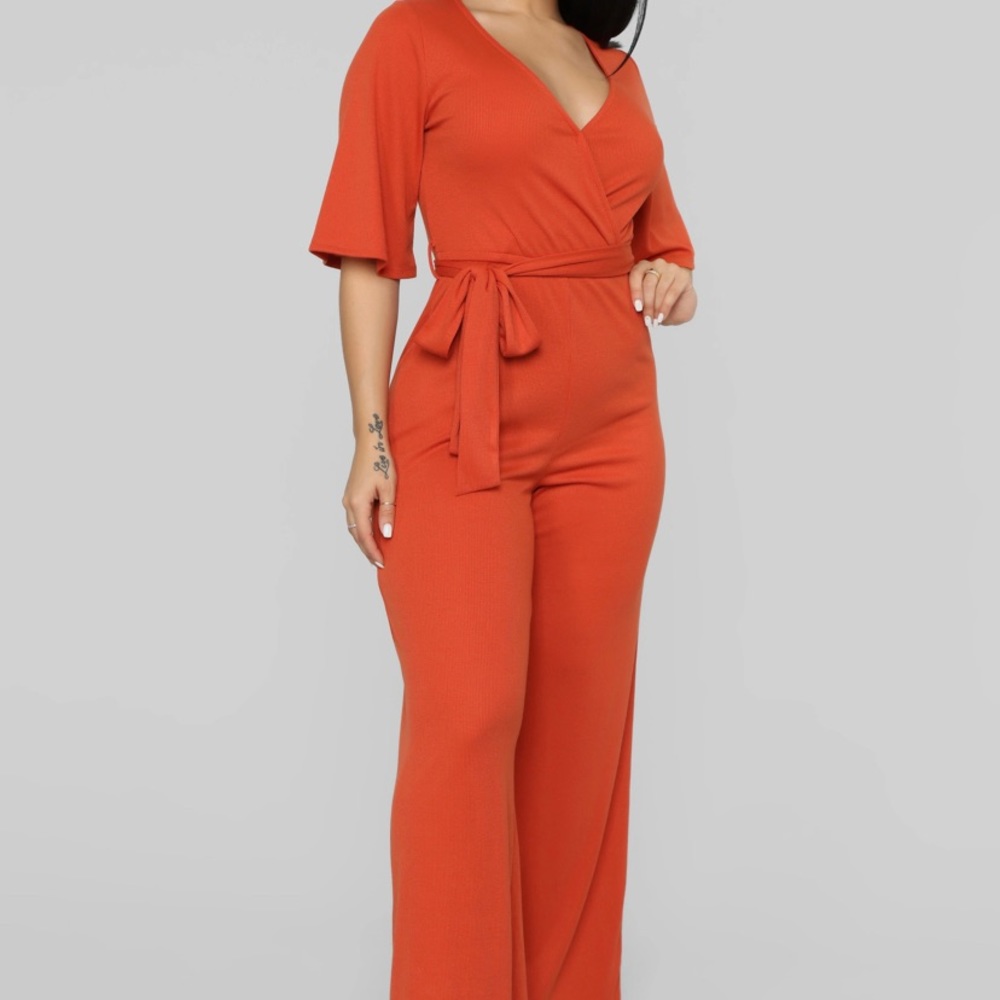Burnt orange, long sleeve, sexy jumpsuit!